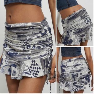 UO Janelle Ruched Ruffle Mini Skirt